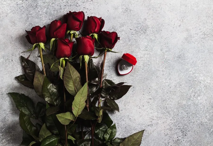 valentines-day-marry-me-wedding-engagement-ring-box-with-red-rose-gift_114579-422.jpg