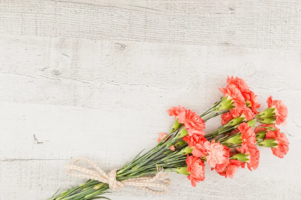 top-view-flower-bouquet-wooden-background_23-2148172566.jpg