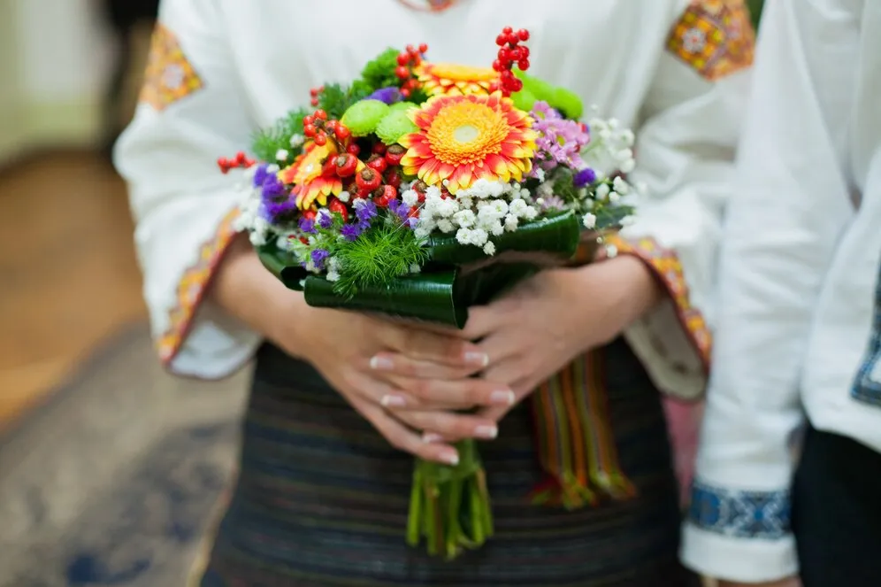 ukrainian-bride-native-embroidery-holding-beautiful-colorful-autumn-bouquet_1304-3905.jpg